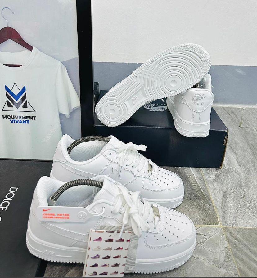 White Nike Air Force 1 Sneakers on Display perfume 1 